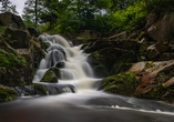 Wasserfälle, wie beispielsweise den Ilse-Wasserfall, finden Sie im Harz.