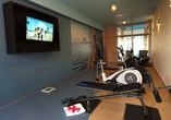 Powern Sie sich im Fitnessraum aus.