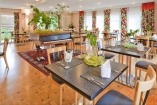 Der helle und freundliche Frühstücksraum des Hotels Aspire Kronprinz