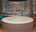Im Wellnessbereich erwartet Sie unter anderem ein Whirlpool.