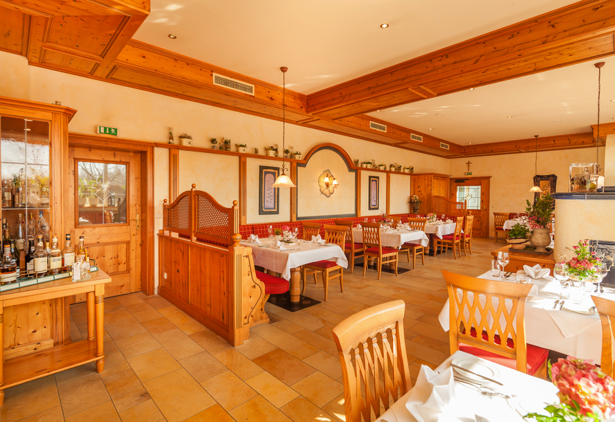 Lassen Sie sich im Restaurant mit traditioneller und moderner Küche verwöhnen. 
