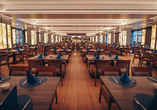 Im Restaurant werden Sie mit köstlichen Speisen verwöhnt.