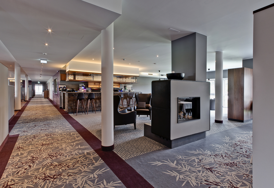 Machen Sie es sich im gemütlichen Loungebereich des Hotels bequem.