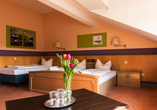 Beispiel eines Doppelzimmers mit Zustellbett