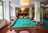 Fordern Sie Ihre Mitreisenden zu einer Runde Billard auf.