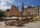 In der „Historischen Wurstkuchl” schmecken Sie Geschichte – mit Blick auf Dom und Altstadt.