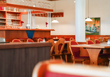 Lassen Sie sich im Restaurant des Hotels mit Köstlichkeiten verwöhnen.