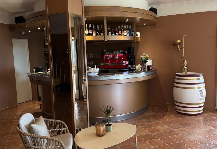 An der Bar erwarten Sie erfrischende Getränke und entspannte Stunden.