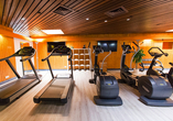 Für die Aktiven steht ein Fitnessraum im Hotel bereit.