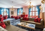 Lassen Sie sich in der gemütlichen Lobby Ihres Hotels nieder.