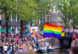 Die WorldPride wird in den Straßen und auf den Kanälen von Amsterdam gefeiert.
