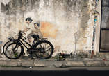 Schlendern Sie durch die Straßen und lassen Sie sich von der Street Art in Penang inspirieren. 