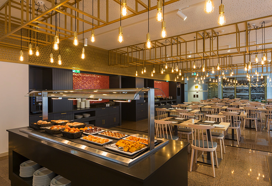 Das Restaurant des Hotels Estrela De Fátima verwöhnt Sie mit Köstlichkeiten.