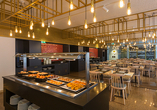Das Restaurant des Hotels Estrela De Fátima verwöhnt Sie mit Köstlichkeiten.