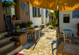 Einer typisch griechischen Taverne sollten Sie auf jeden Fall einen Besuch abstatten.