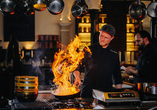 Die offene Showküche sorgt im Restaurant Pferdestall für ein besonderes kulinarisches Erlebnis.