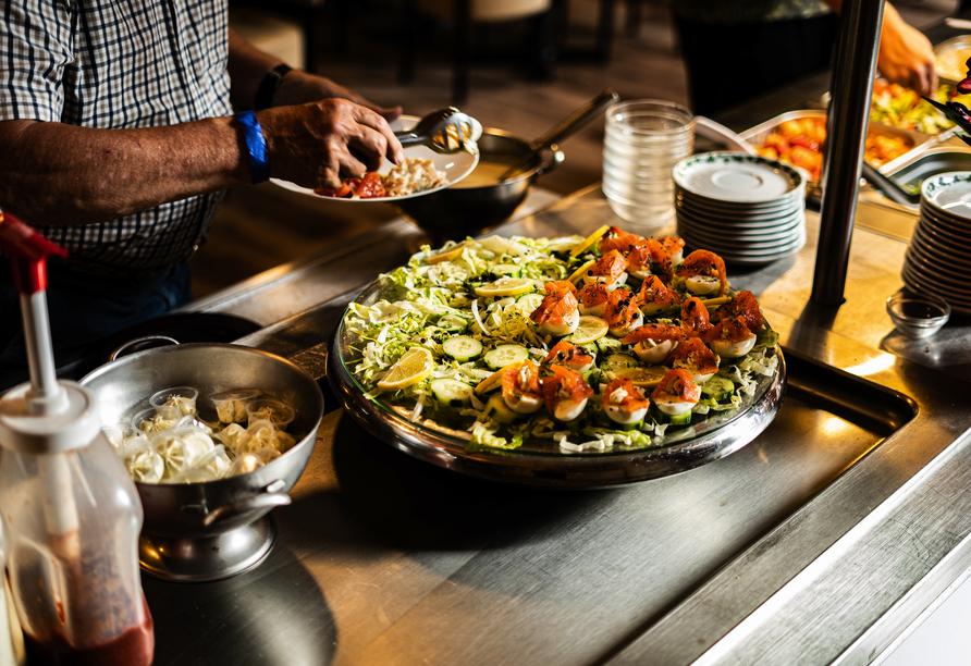 Im Hotelrestaurant werden Sie mit schmackhaften Speisen verwöhnt.