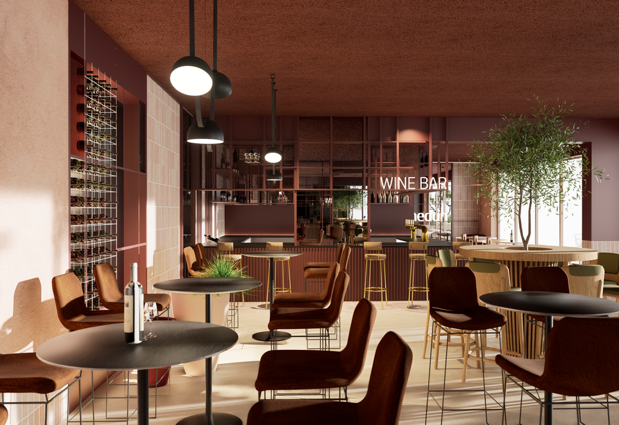 Genießen Sie einen leckeren Wein in der Weinbar (Modellbild).