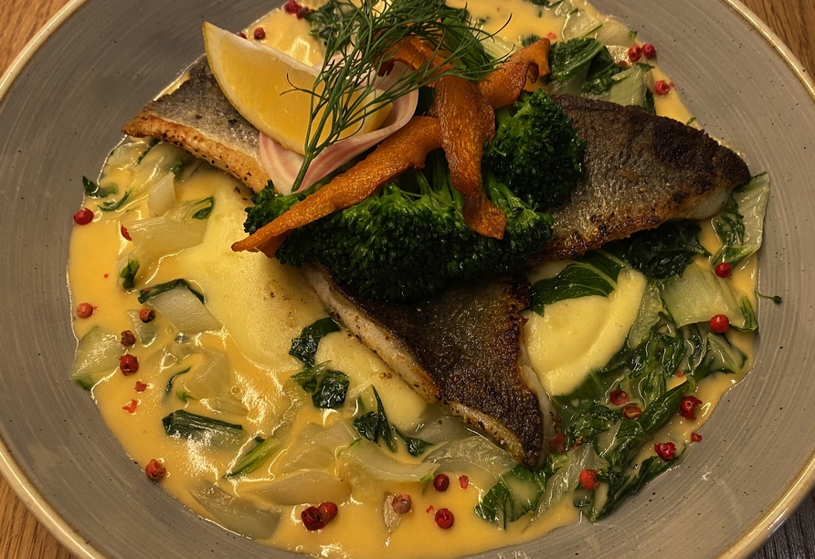 Im Restaurant erwarten Sie kulinarische Gaumenfreuden.