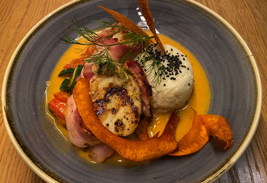 Lassen Sie sich von der regionalen und saisonalen Küche verzaubern.