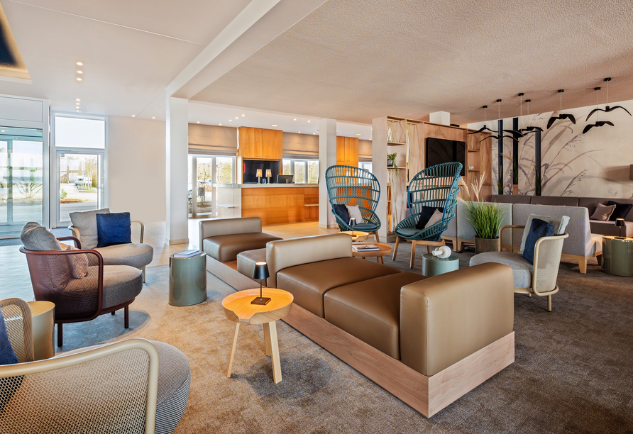 Der stilvolle Lobbybereich empfängt Sie in modernem Ambiente.