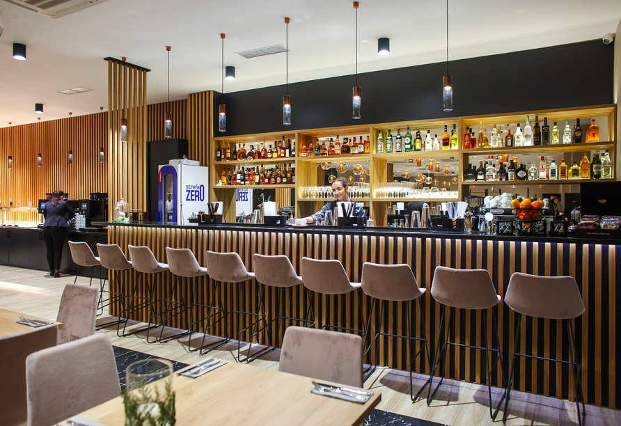 Nehmen Sie sich eine Verschnaufpause und genießen Sie ein Getränk an der Lobbybar.