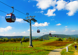 Fahren Sie mit der Ettelsberg-Seilbahn und genießen Sie die weite Aussicht.