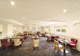 Das Restaurant des Beispielhotels The Ivy Bush Royal Hotel wird Sie mit leckeren Speisen verwöhnen.