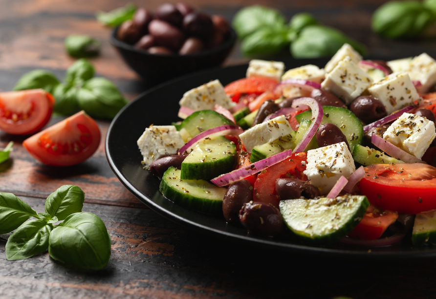 Probieren Sie griechische Köstlichkeiten.