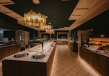 Das Buffet bietet Ihnen täglich köstliches Essen.