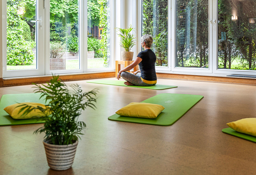 Finden Sie vollkommene Entspannung beim Yoga.
