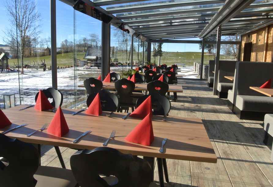 Machen Sie es sich im Wintergarten gemütlich.