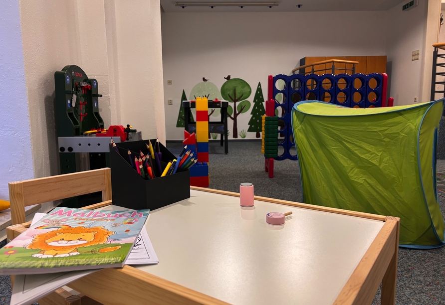 Kleine Gäste können Sich im Spielzimmer austoben.