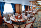 Freuen Sie sich auf kulinarische Höhepunkte in Ihrem Beispielschiff-Restaurant.