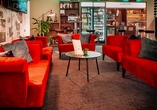 Die Lobby Ihres Hotels lädt zum Verweilen ein.