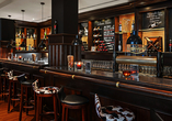 An der Bar vom Steakhouse Alte Münze warten köstliche Getränke auf Sie (auf eigene Kosten).