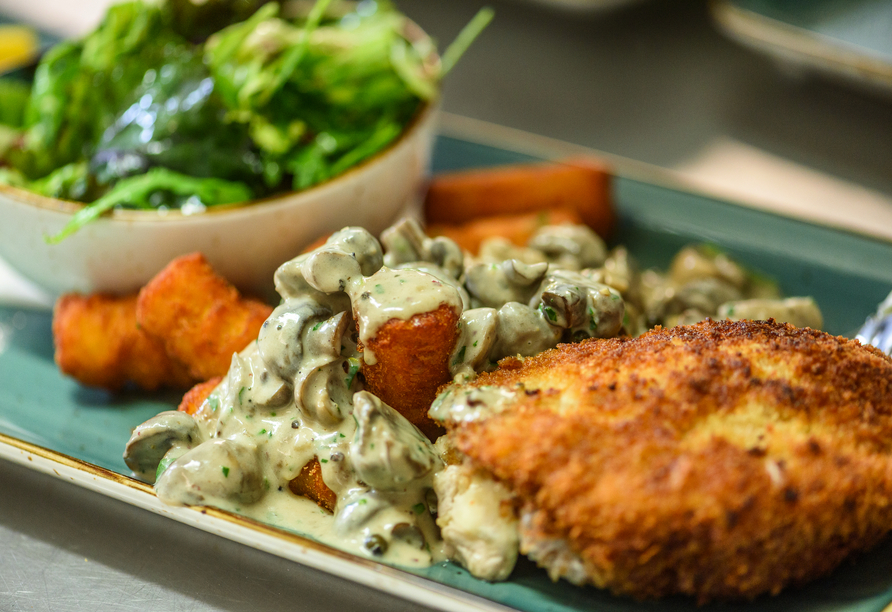 Im Restaurant Ihres Hotels werden Sie mit regionalen Spezialitäten verköstigt.