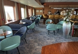 In der Lounge Bar an Bord erwarten Sie erfrischende Getränke und gute Gesellschaft.