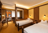 Beispiel eines Doppelzimmers mit Zustellbett