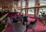Die Lounge mit Bar lädt zum gemütlichen Zusammensein ein.