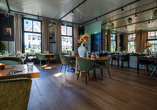 Lassen Sie sich im Restaurant mit kulinarischen Köstlichkeiten verwöhnen.