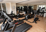 Sportbegeisterte können sich im Fitnessraum des Hotels ordentlich auspowern.