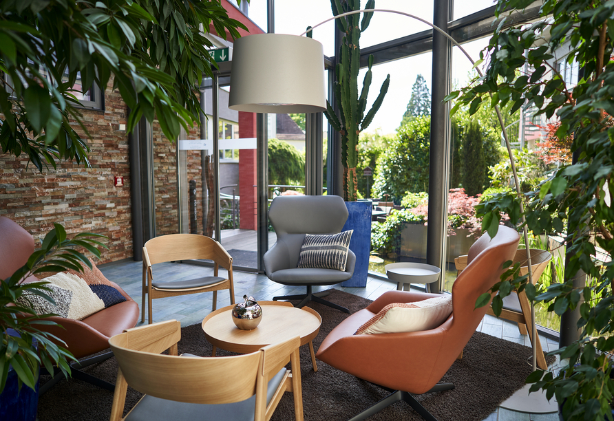Die stilvolle Lounge lädt zum Verweilen in gemütlicher Atmosphäre ein.