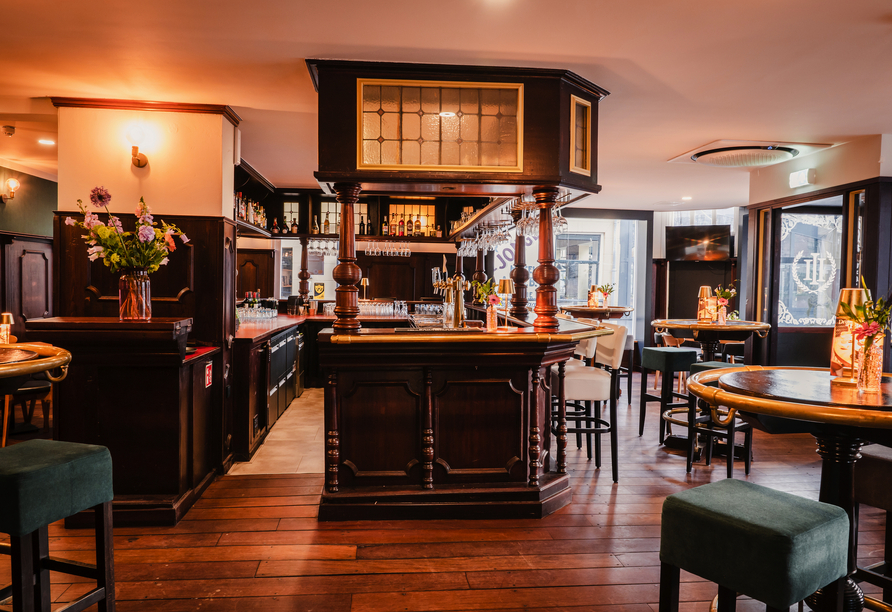 Die Hotelbar lädt zu entspannten Stunden in angenehmer Atmosphäre ein.