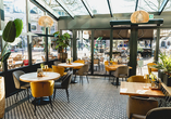 Der Wintergarten verbindet kulinarischen Genuss mit einem stilvollen Ambiente.