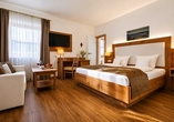 Beispielbild eines Doppelzimmers mit Zustellbett
