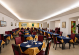 Lassen Sie sich im gemütlichen Restaurant verwöhnen.