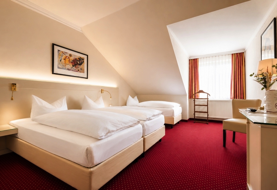 Beispielbild eines Doppelzimmers mit Zustellbett
