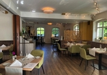 Das gemütliche Restaurant im Ringhotel Villa Margarete verwöhnt Sie mit köstlichen Speisen.