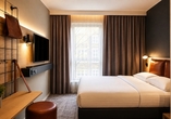Beispiel eines Doppelzimmers „Moxy Sleeper Queen“